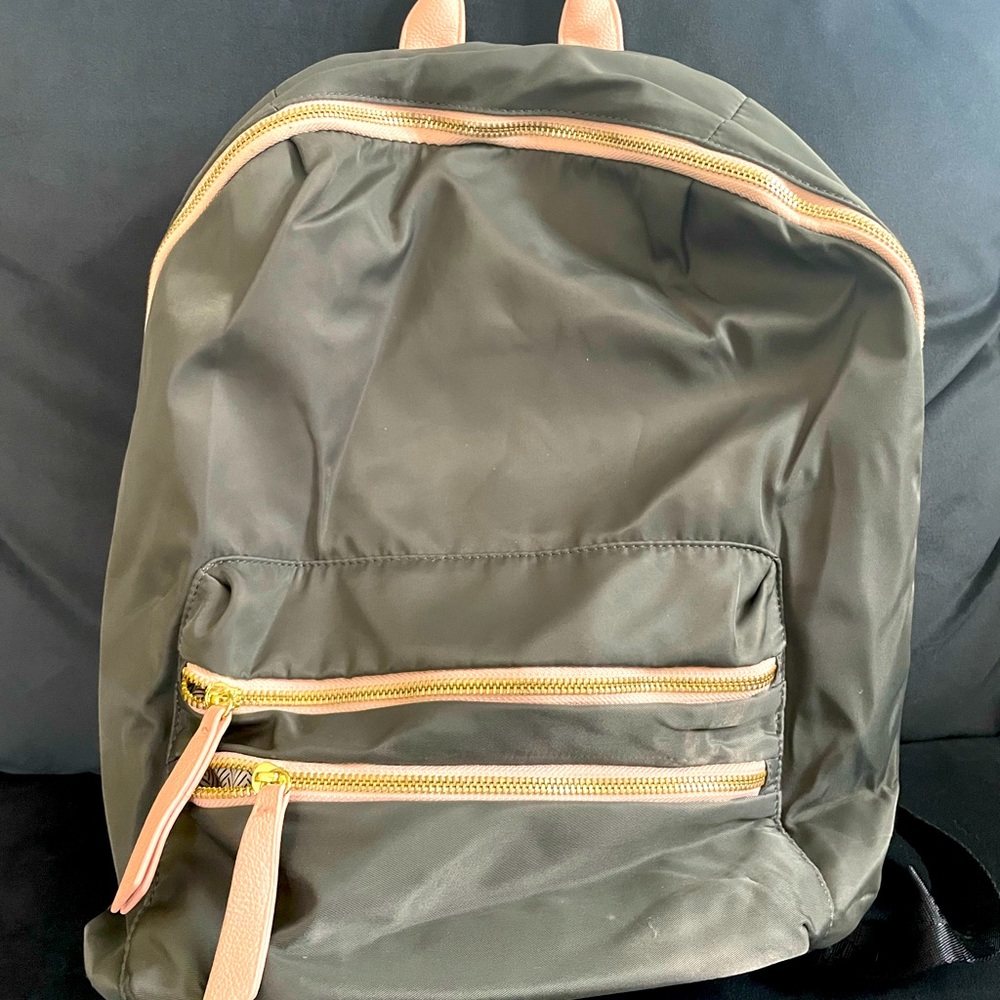 Grey with pink accents Steve Madden backpack.